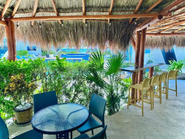 Comfortable deck chairs and outdoor dining table